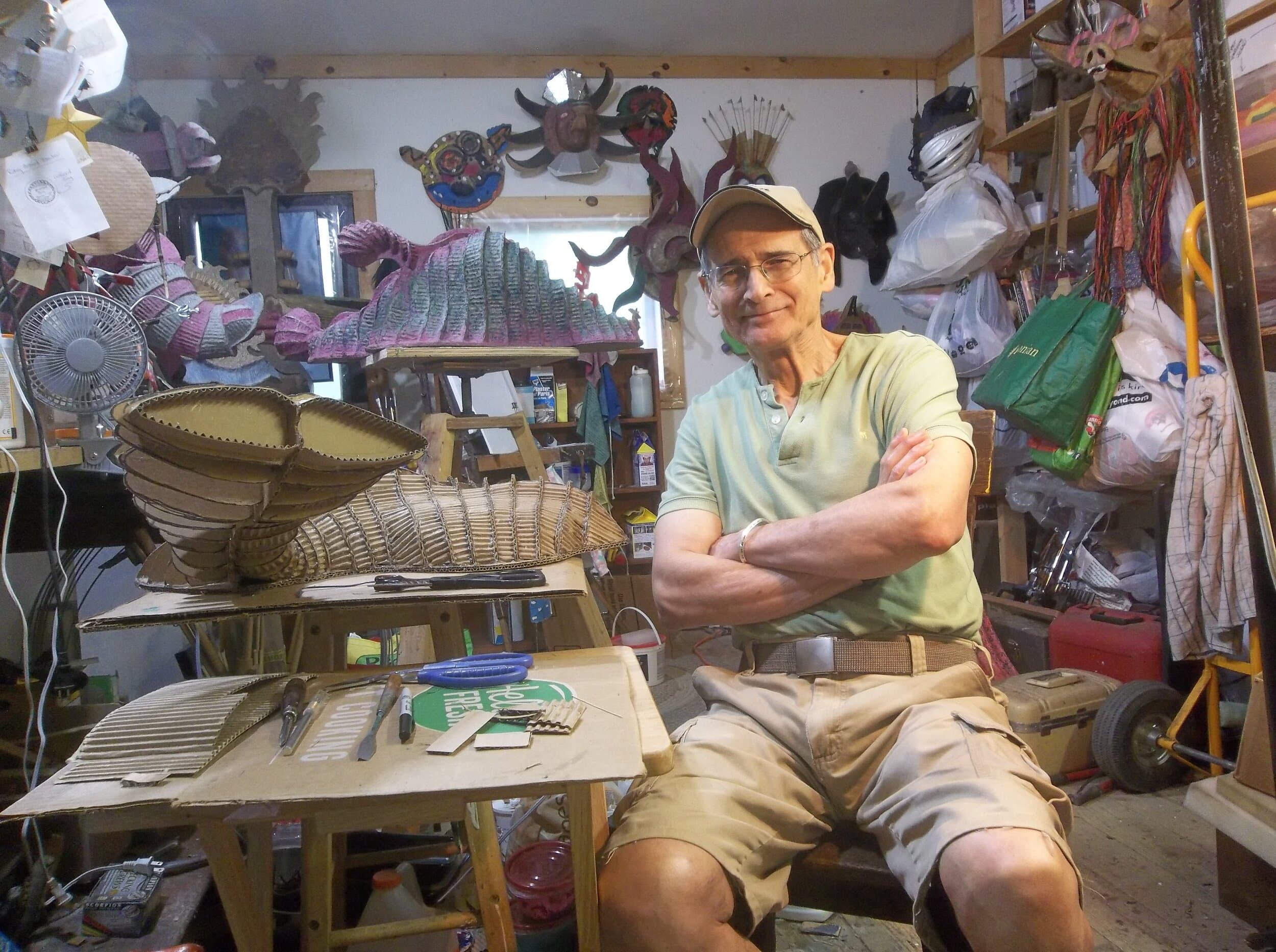 Art Costa sitting in studio